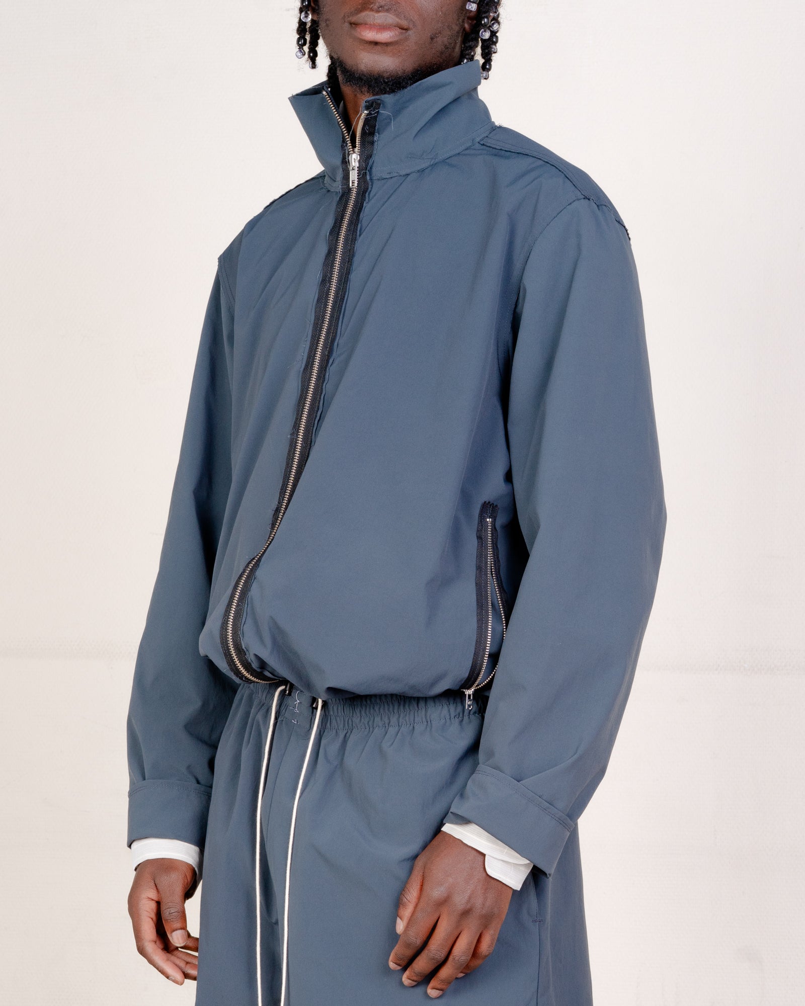 CF.21.09.02.01 TRACK JACKET technical nylon petrol