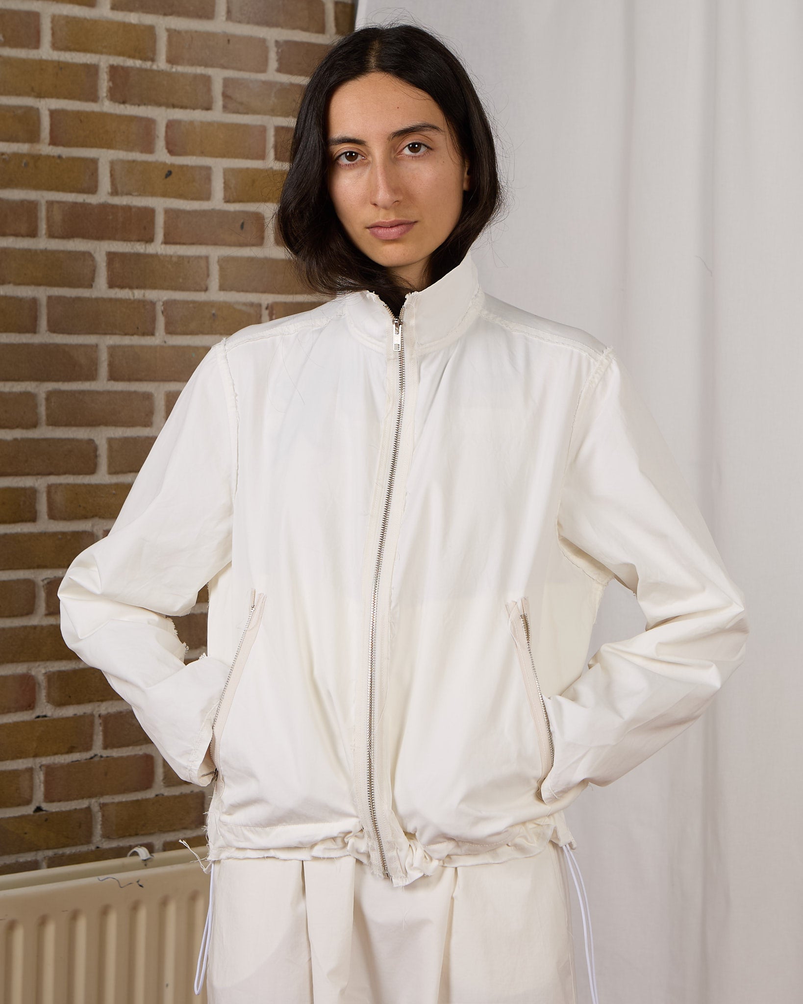 CF.23.09.01.01 TRACK JACKET light canvas optical white