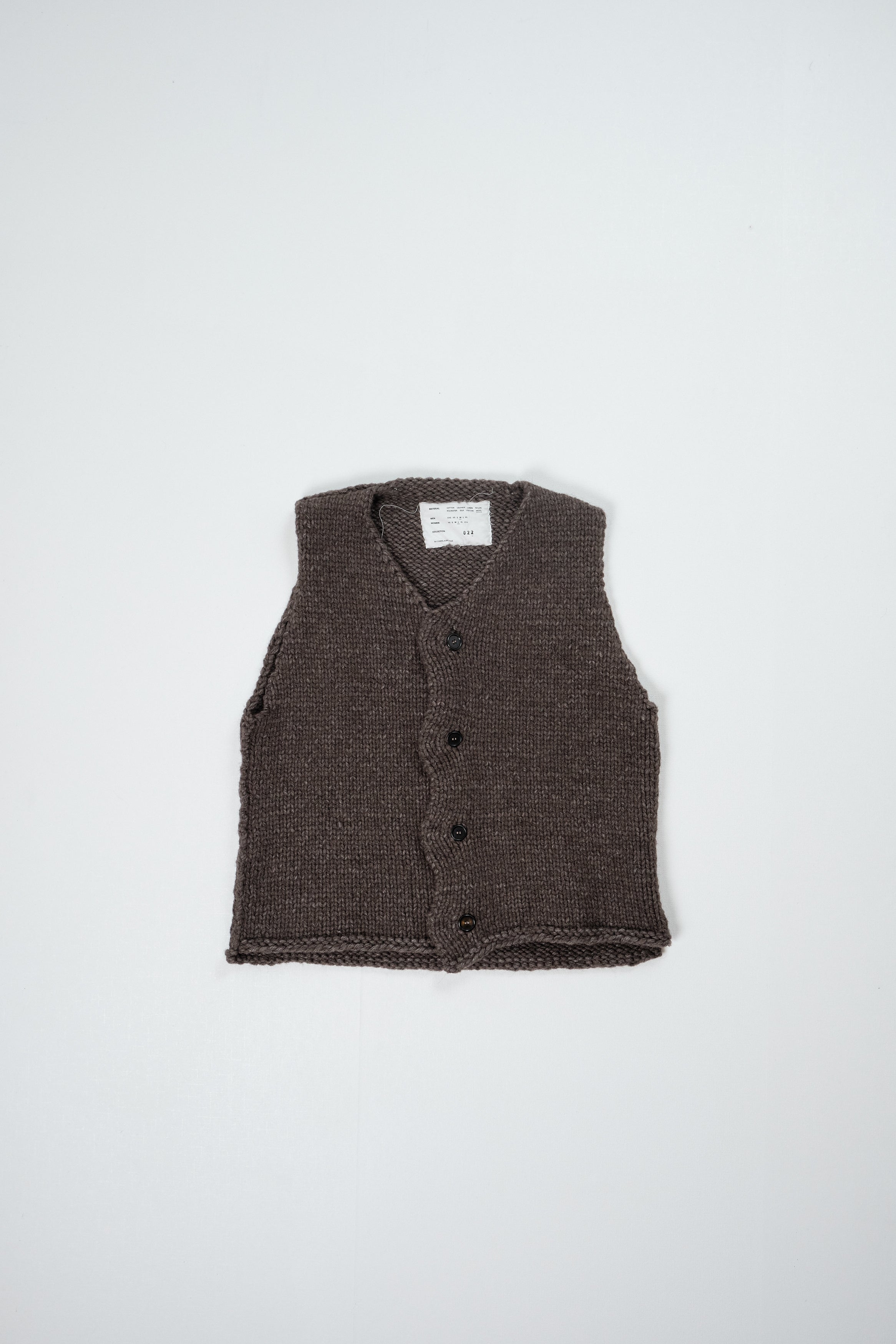 CF.22.03.05.01 WOBBLY V-NECK SPENCER handknit natural brown melange