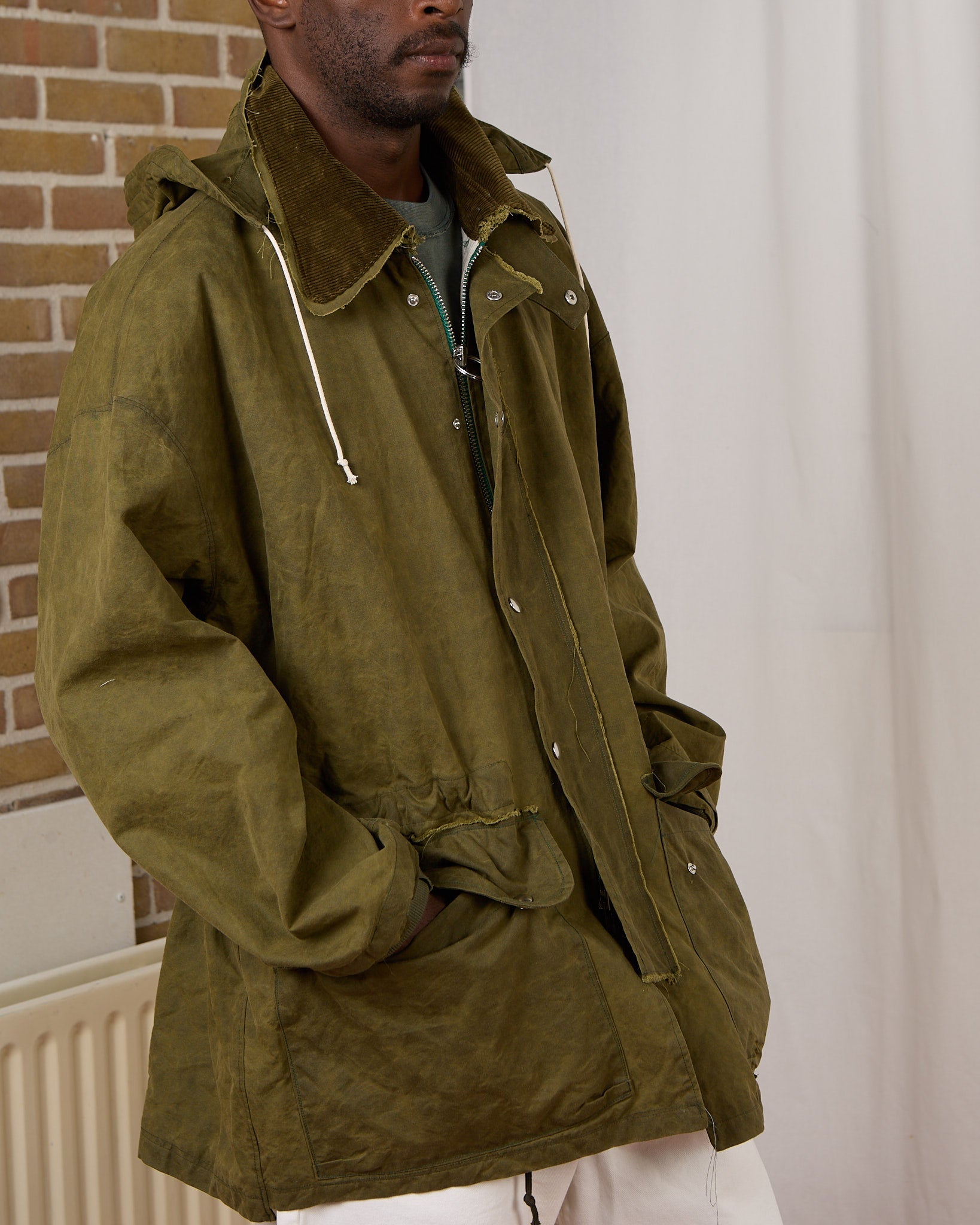 CF.23.10.05.01 OUTDOOR JACKET waxed cotton faded green