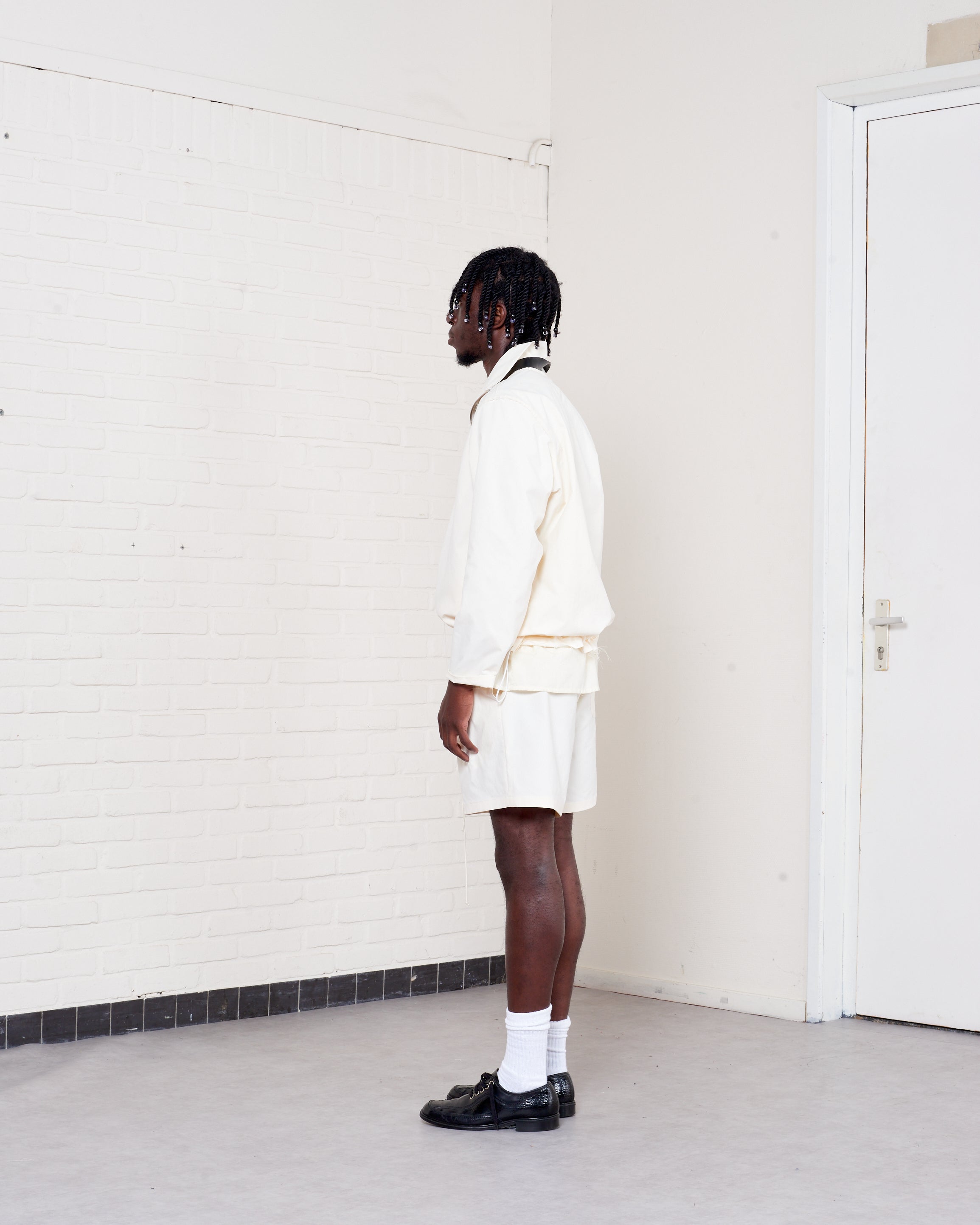 CF.21.13.01.06 KNEE SHORTS technical nylon light yellow