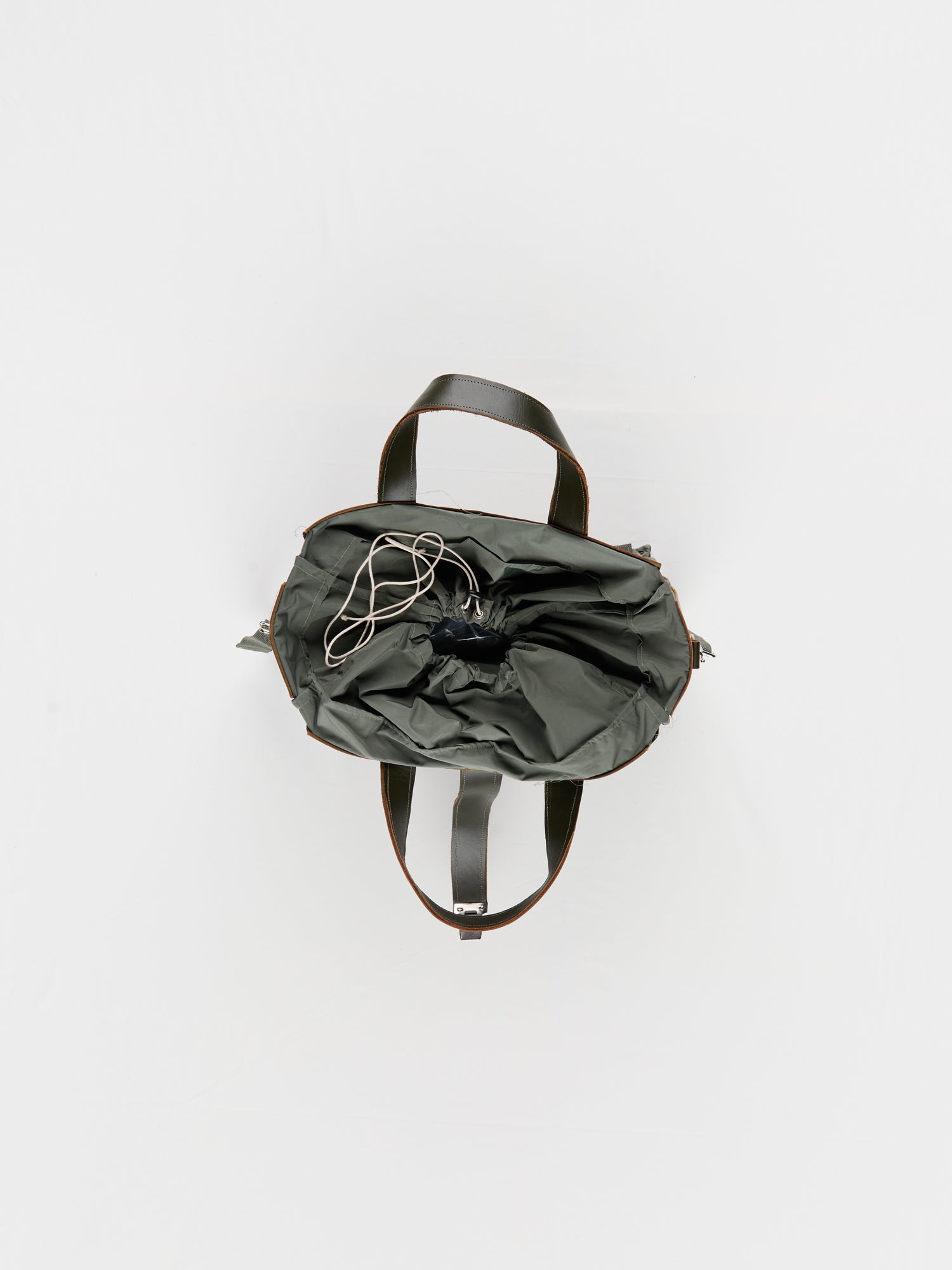 CF.23.14.03.02 CROOCKED PATCH BAG cow leather + nylon green/sage